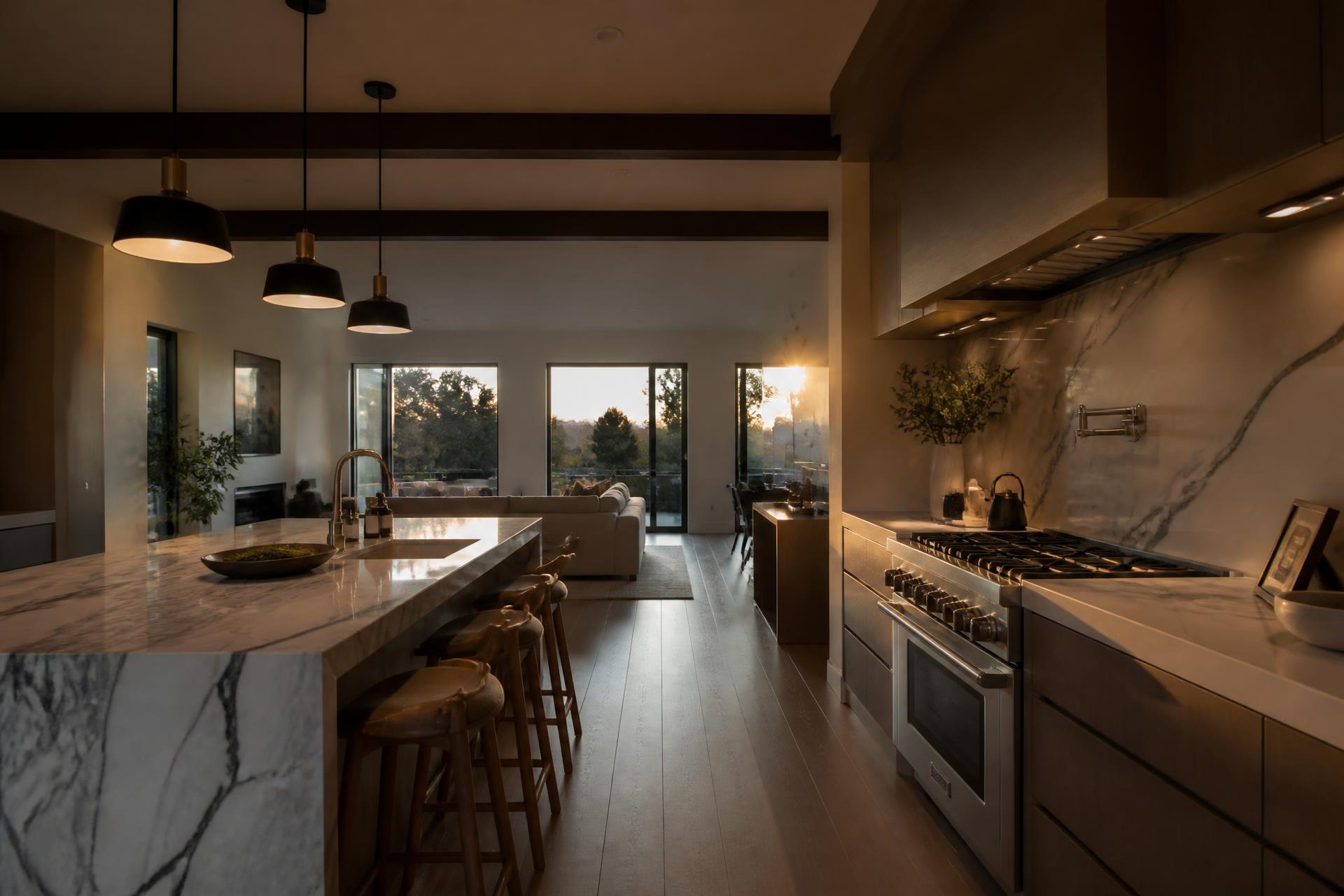 Warmly lit remodeled kitchen and living space